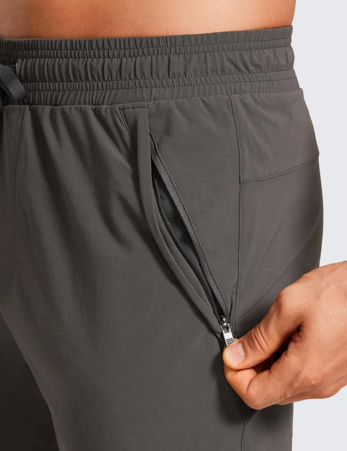 CRZ YOGA Athletic Joggers for Men Lightweight Water Resistant Outdoor Workout Pants with Zip Pockets